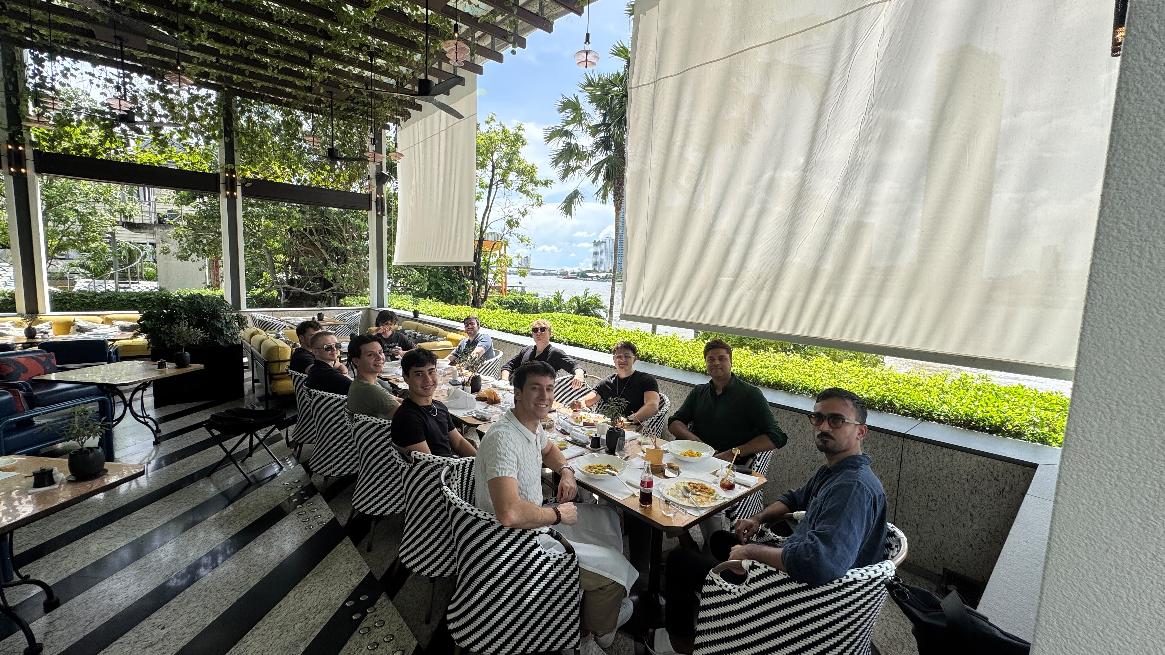 The Raytech team gathered around a table